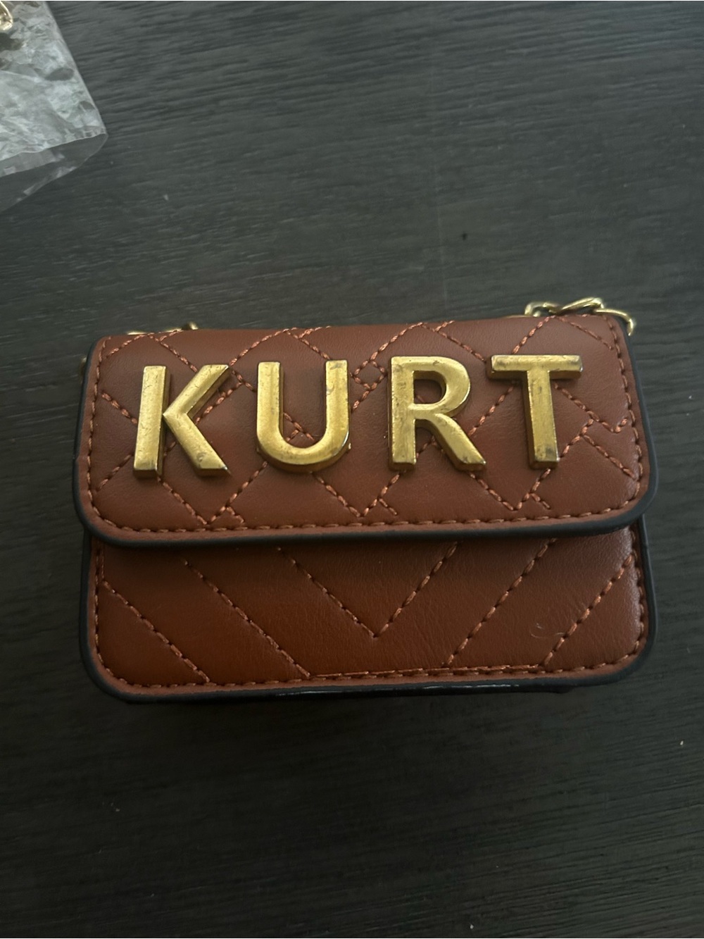 Brown Quilted Mini Crossbody Bag with Gold Lettering